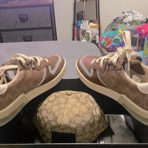Coach shoes & coach hat.